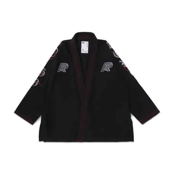 AP Tough Love Gi jacket front in black with AP chest embroidery and red lapel stitching