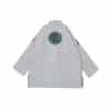 Back view of gray Albino and Preto DCDT GLM kids gi jacket with round badge