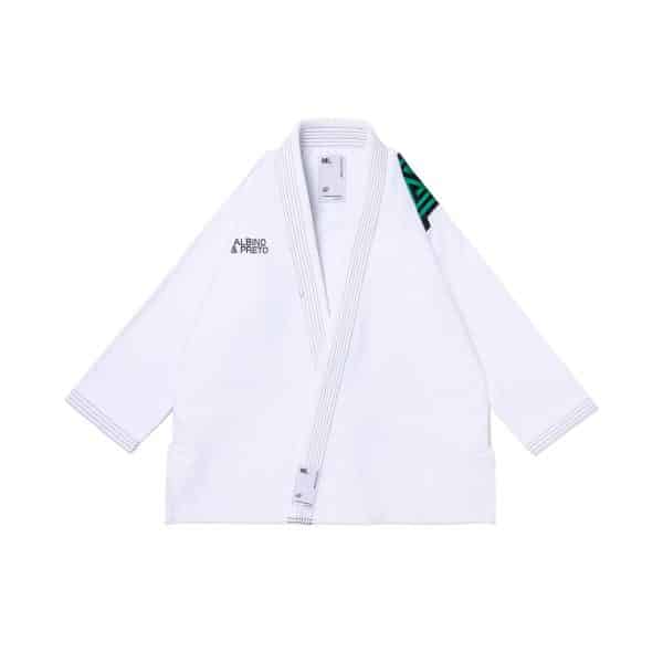 White Albino and Preto STP Gi jacket front with green shoulder patch