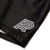 Close up of black Albino and Preto compression shorts with white AP leg logo