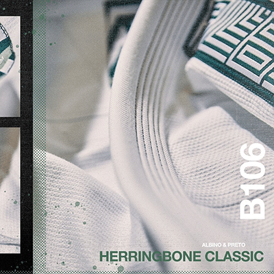 Albino and Preto B106 white gi collar with tricolor herringbone patch detail