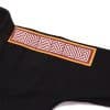 Albino and Preto B111 YBM black gi shoulder maze patch on pearl weave fabric