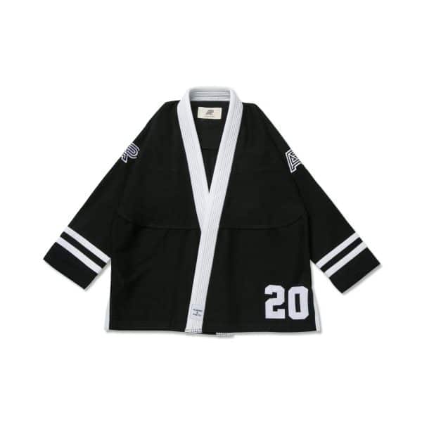 Albino and Preto 2023 Team Gi black jacket front with white collar, sleeve marks, stripes, and 20 patch.