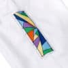 AP B108 pants side patch close-up with multicolor stained glass design